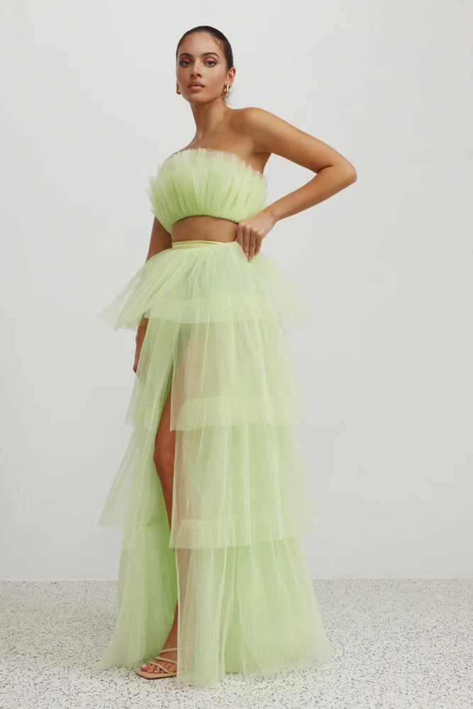 Lorena Set Mojito by Lexi - Two piece set with floor length skirt and thigh high split  Strapless bodice with layers of pleated tulle  Four tiered tulle skirt with satin waistband and inbuilt bodysuit  Bodice and skirt fully lined with stretch mesh Fastened with invisible zippers 